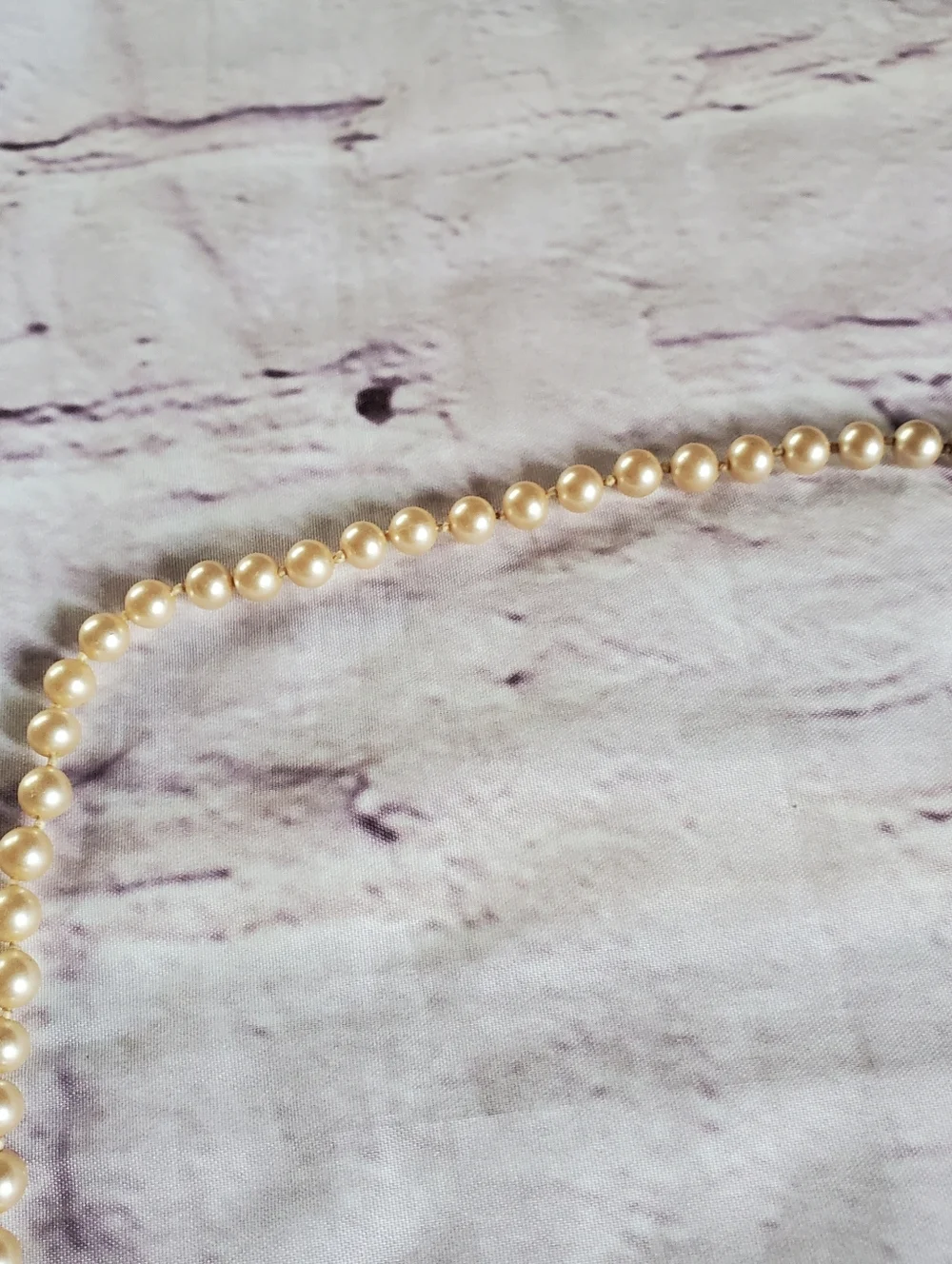 Vintage glass pearl necklace with sterling vermeil filigree clasp and hand knot